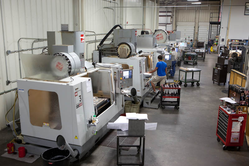 One row of CNC mills in our spacious, climate-controlled facility.